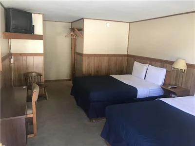 Room 9 with two queen beds — Prospector Motel